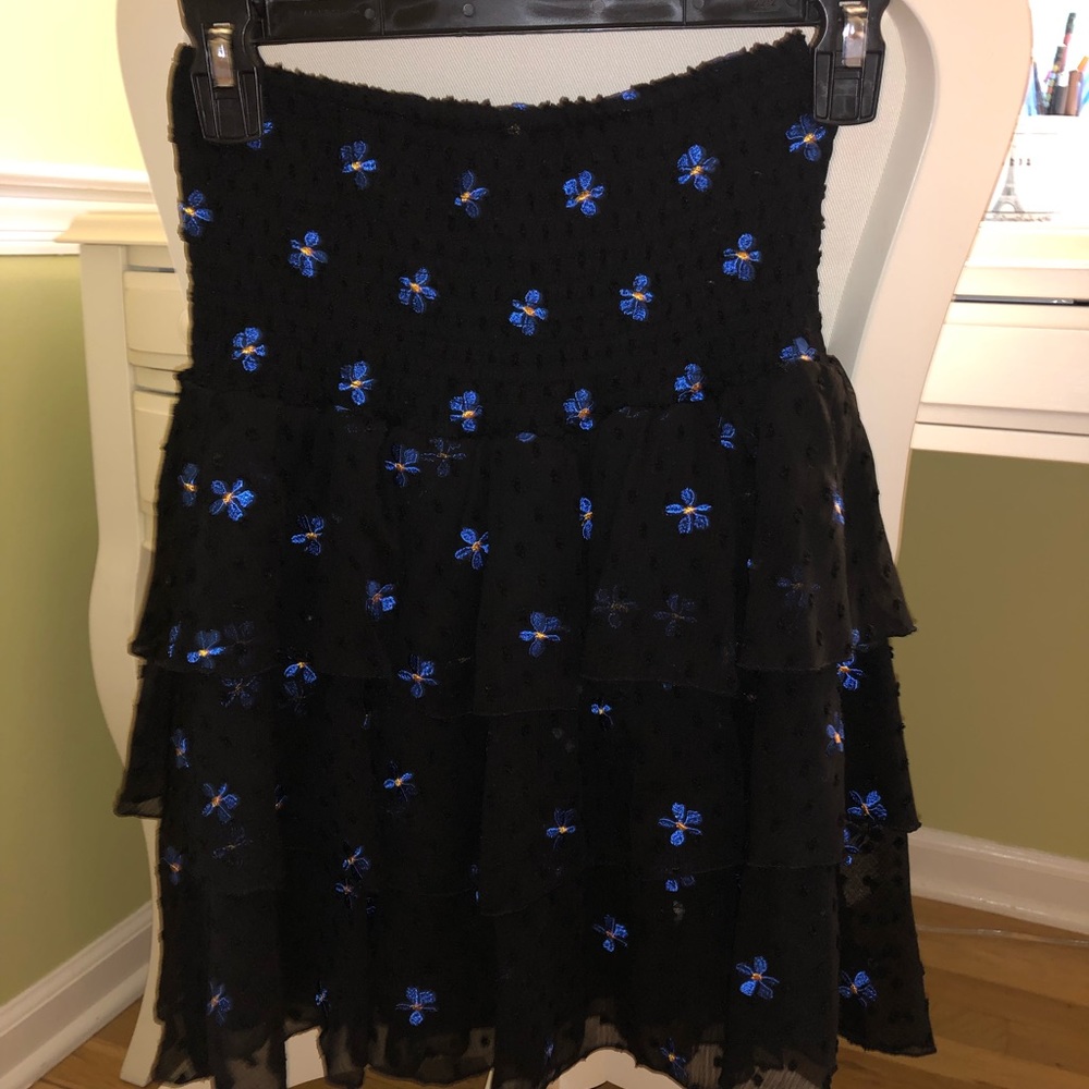 Maje black ruffle skirt with blue flowers